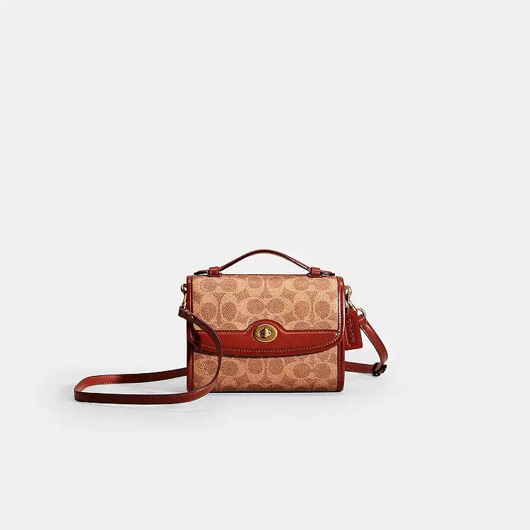 Coach Kip Turnlock Crossbody in Signature Canvas